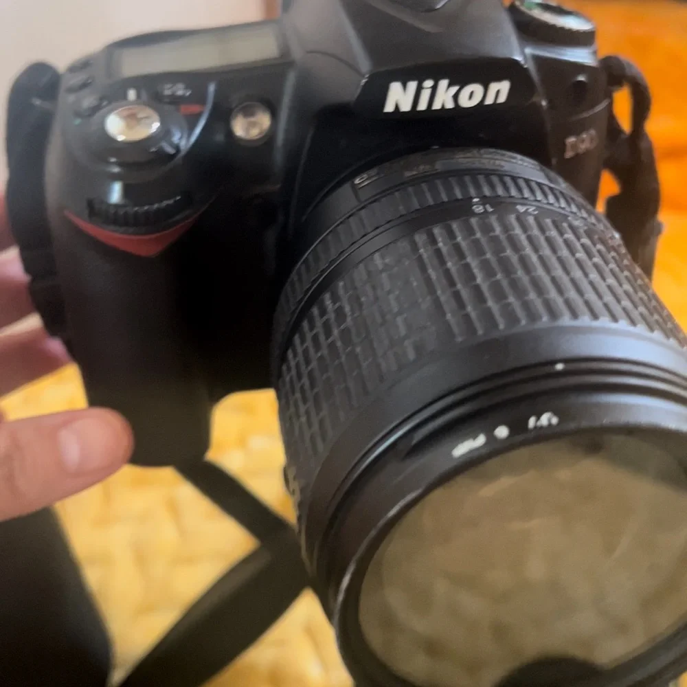 Nikon D90 with two lens and the flash